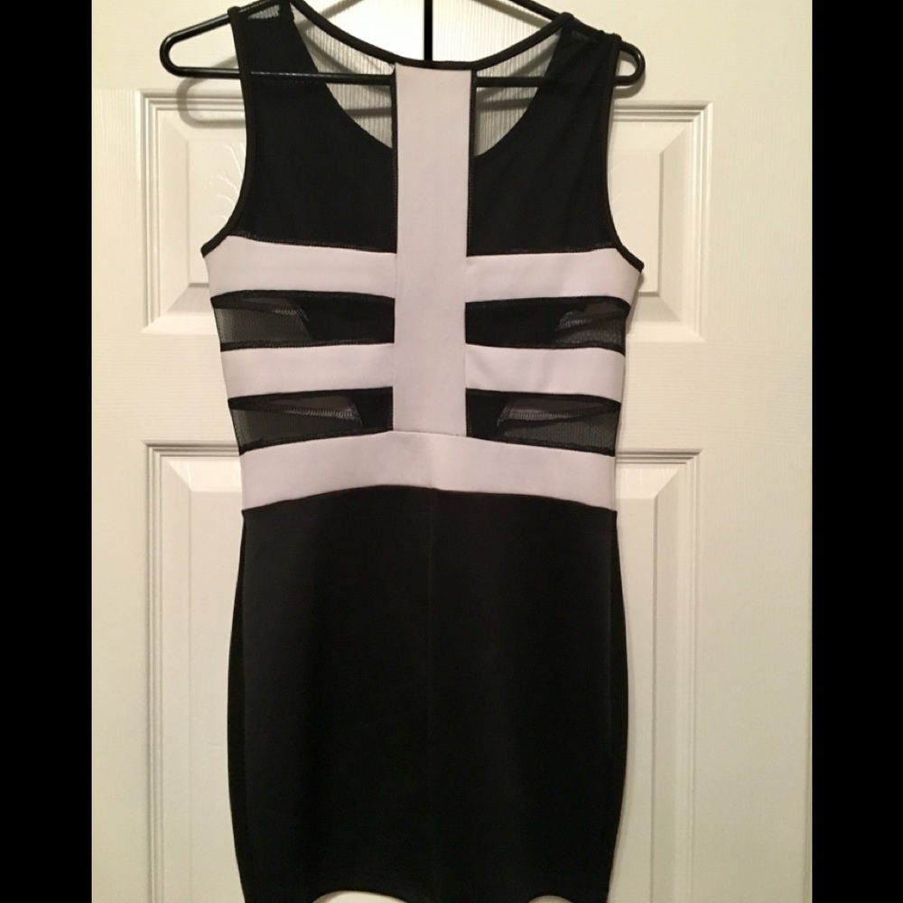 Black & White fitted dress.  Mesh sides.